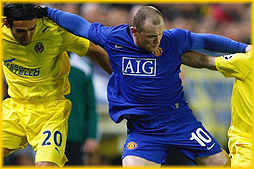 Rooney tussles with players